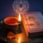 Devotional Mantras for Healing, Prosperity, and Protection: My Clumsy, Honest Ride Diya, mantra book, and marigold on brass thali.